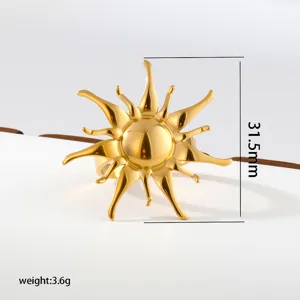 Detailed close-up of a bold gold sunburst stainless steel adjustable ring showing exact size.