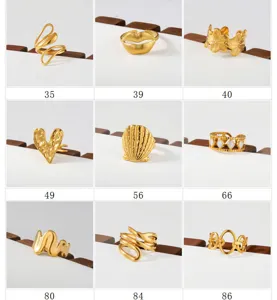 Gold stainless steel stackable rings set featuring chic geometric, floral and heart designs.