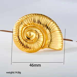 Golden nautilus shell hair clip detail view, elegant metallic hair accessory for daily wear.