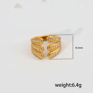 Gold stainless steel multi-layer open ring with sparkling zirconia and chic clover cutout.