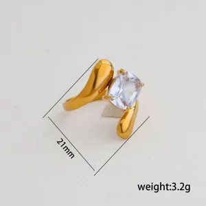 Detail view of the elegant gold stainless steel ring featuring a sparkling square cubic zirconia.