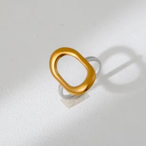 Trendy two-tone stainless steel ring with bold irregular geometric design for daily style.