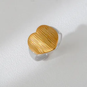 Two-tone heart ring geometric gold and silver statement finger jewelry stylish accessory