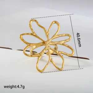 Gold stainless steel hollow flower ring elegant statement openwork floral jewelry for women.