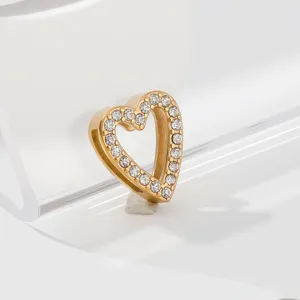 Exquisite gold-tone stainless steel heart pendant charm featuring sparkling clear cubic zirconia stones