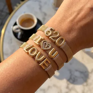 Gold stainless steel mesh strap bracelet set featuring 520 and love letter charms for women fashion.