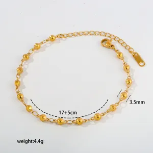 Detail view of gold stainless steel bead chain bracelet showing size and weight specs.