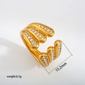 Stainless steel gold open ring with sparkling cubic zirconia, minimalist stackable design.