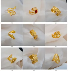 Gold stainless steel open rings detail view, vintage hydraulic adjustable couple ring set.