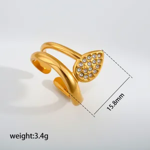 Detailed view of the gold stainless steel ring featuring a crystal teardrop motif and dimensions.