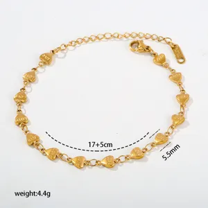 Gold stainless steel heart charm link bracelet with extension chain and size details