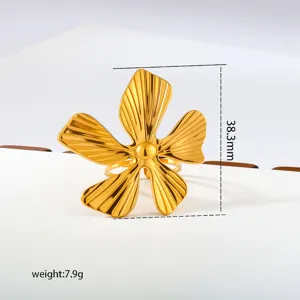 Gold stainless steel flower ring detail view showing precise dimensions and item weight.