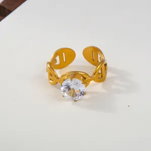 Exquisite detail of the gold stainless steel open ring featuring a sparkling cubic zirconia.