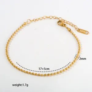 Stainless steel gold ball chain bracelet with extension chain, minimalist stackable wrist jewelry.