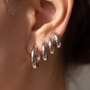 Stainless steel C-shaped chunky hoop earrings set, versatile minimalist silver huggie jewelry.
