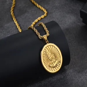 Detail shot of men stainless steel 18k gold plated praying hands pendant rope chain necklace