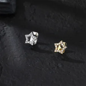 Close-up detail of hollow star grillz, iced out zirconia teeth jewelry, hip hop style.
