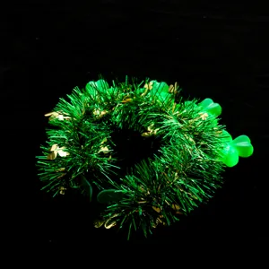 St. Patrick's Day green tinsel headband with glowing shamrock lights and gold foil accents detail.