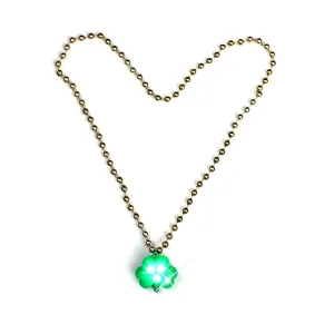 St. Patrick's Day LED glowing shamrock necklace with gold beads, perfect for festive holiday.