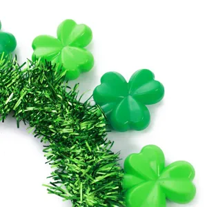 Serre-tête lumineux trèfle de la Saint-Patrick avec guirlande verte et lumières LED pour fête.