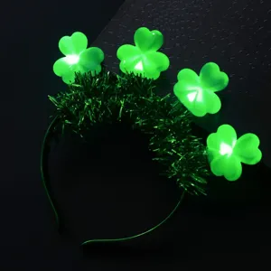 LED illuminated shamrock headband with tinsel for St Patrick's Day party festival use