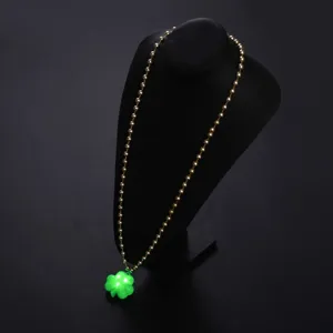 St. Patrick's Day LED glowing shamrock necklace detail view, green clover pendant.