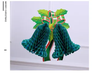 Dettaglio campana di carta natalizia, bel design alveolato verde per oggetti di scena.