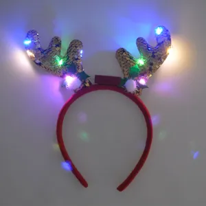 Serre-tête renne de Noël LED à paillettes détail avec lumières brillantes et pompons