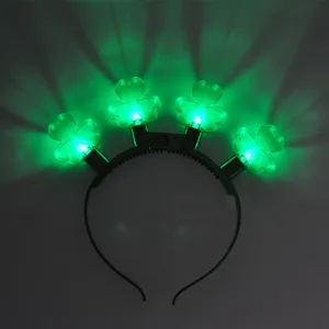 LED green shamrock headband for St. Patrick's day glowing party hair hoop accessory.