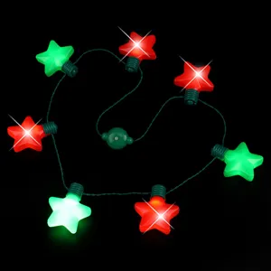 Close-up detail of Christmas LED glowing star necklace featuring red and green pentagram lights.