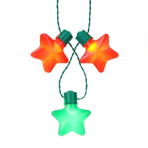 LED star necklace string light detail shot, festive holiday party glowing star decoration props