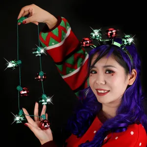 Christmas LED light-up headband and string lights detail, festive party decor close-up.