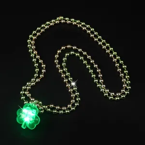 St. Patrick's Day LED light up shamrock bead necklace, glowing green clover holiday party jewelry.