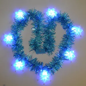 LED light-up snowflake tinsel necklace for Christmas party festive holiday decoration.