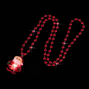 Christmas red bead necklace with light-up Santa Claus pendant, festive holiday party jewelry.
