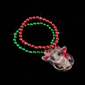 Christmas flashing reindeer pendant necklace, red and green bead chain for holiday detail.