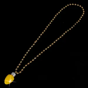 Close-up detail of the glowing LED light bulb pendant necklace, featuring a stylish golden chain.