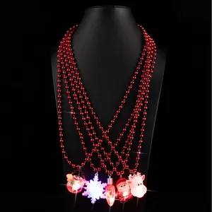 Christmas LED glowing bead necklace with multiple holiday pendants for festive party decor.