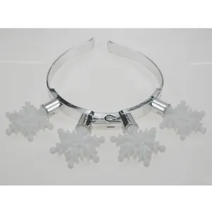 LED light up snowflake headband detail view, flashing glowing party hair hoop for festival celebration.