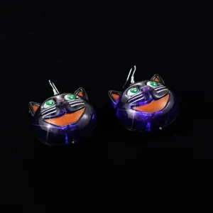 Halloween glowing purple cat earrings detail view, cute LED light up feline jewelry.