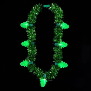 Christmas light up tinsel necklace detail view, green tree pendant holiday party accessory