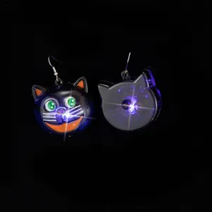 Halloween glowing black cat earrings with LED lights, fun festive costume party jewelry.