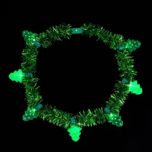Christmas flashing tinsel necklace detail view, green tree light up holiday party accessory.