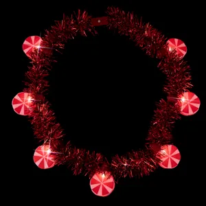Collar de guirnalda de caramelos luminosos de Navidad con siete luces para decoracion festiva.
