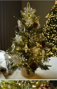 Mini künstlicher Weihnachtsbaum mit warmen Lichtern und Kristall-Schneeflocken für die Deko.