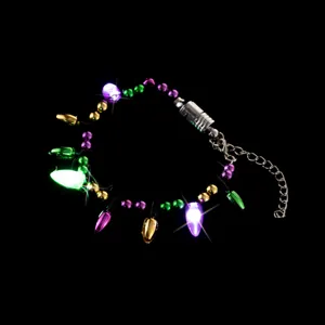 LED light-up bracelet detail shot, colorful plastic beads and glowing bulb design for festival.