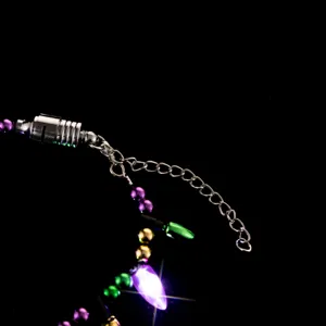 LED glowing festival beaded bracelet with colorful charms and extension chain for party.