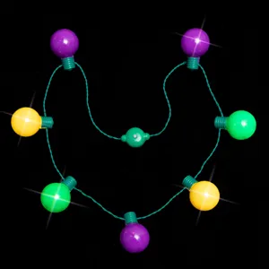 LED light up Mardi Gras necklace glowing party props colorful bulb string jewelry detail shot.