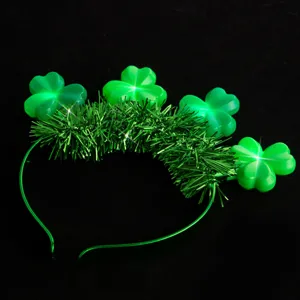 St. Patrick's Day light up clover headband, glowing green tinsel hair hoop detail view.