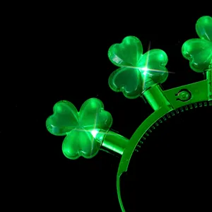 LED glowing clover headband for St. Patrick's Day party, green plastic hair hoop.